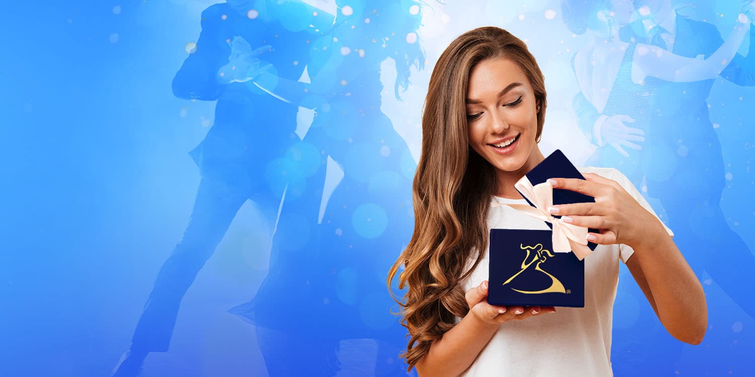 Young woman opens the gift of dance lessons